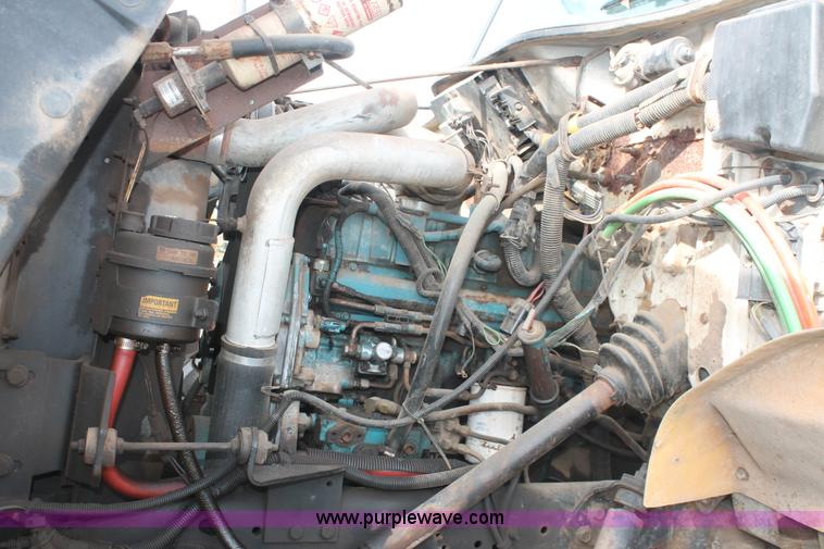 image for item H8266 1996 International 4900 floater spreader truck