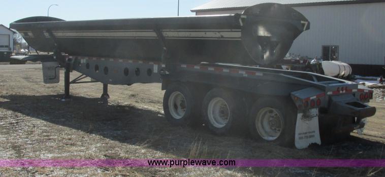 image for item E5414 2003 Smithco 3000VC triple axle side dump trailer