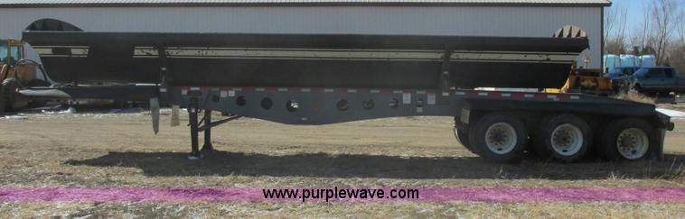 image for item E5414 2003 Smithco 3000VC triple axle side dump trailer