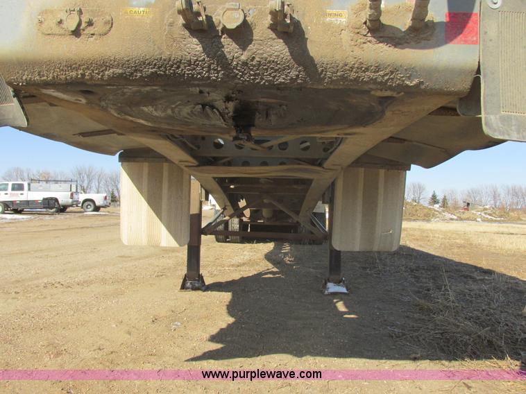 image for item E5414 2003 Smithco 3000VC triple axle side dump trailer