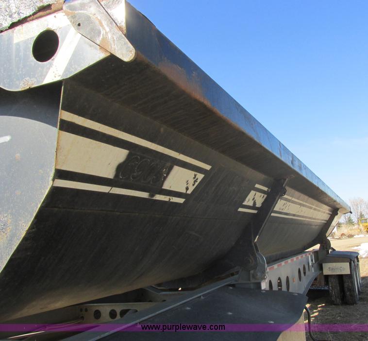 image for item E5414 2003 Smithco 3000VC triple axle side dump trailer