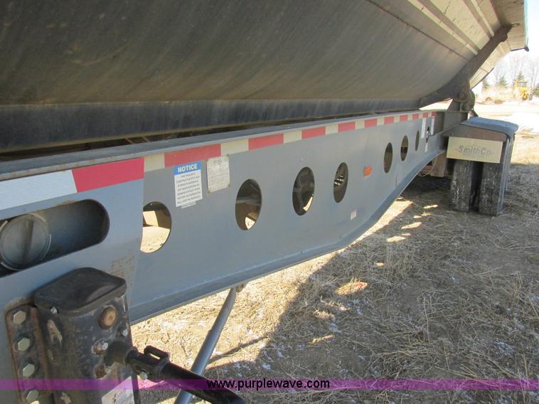 image for item E5414 2003 Smithco 3000VC triple axle side dump trailer