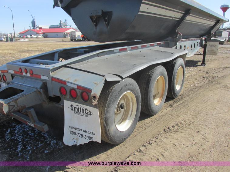 image for item E5414 2003 Smithco 3000VC triple axle side dump trailer