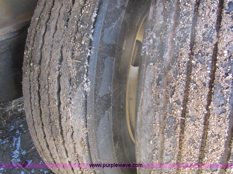 image for item E5414 2003 Smithco 3000VC triple axle side dump trailer