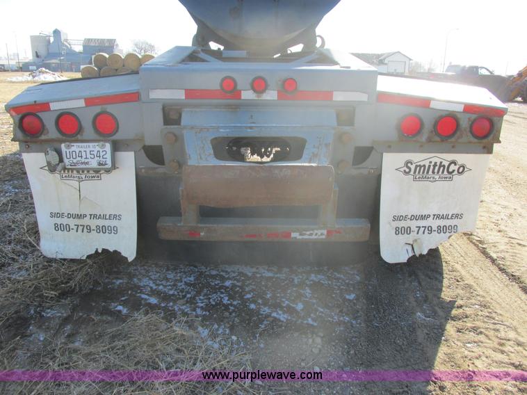 image for item E5414 2003 Smithco 3000VC triple axle side dump trailer