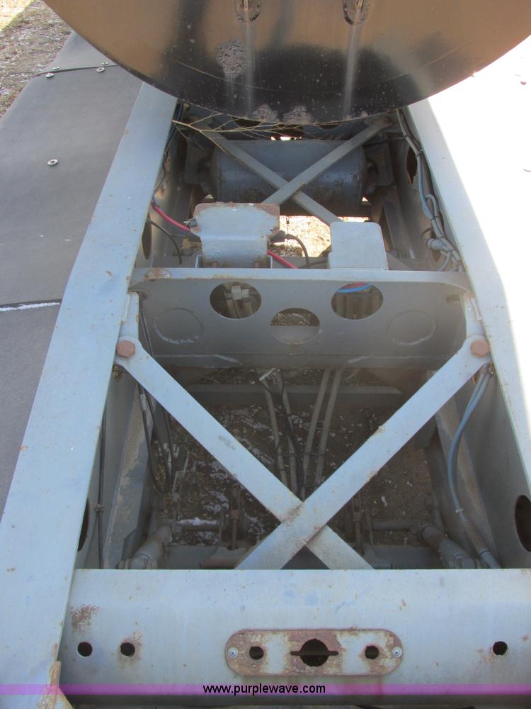 image for item E5414 2003 Smithco 3000VC triple axle side dump trailer