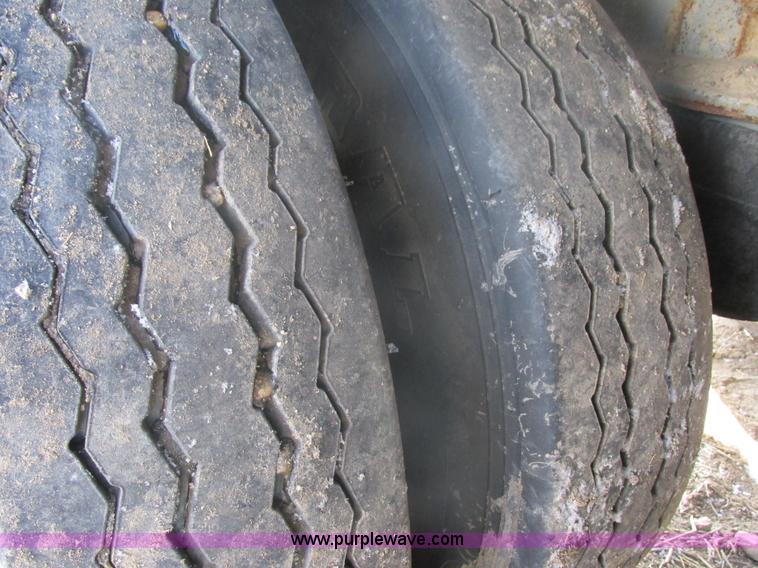 image for item E5414 2003 Smithco 3000VC triple axle side dump trailer