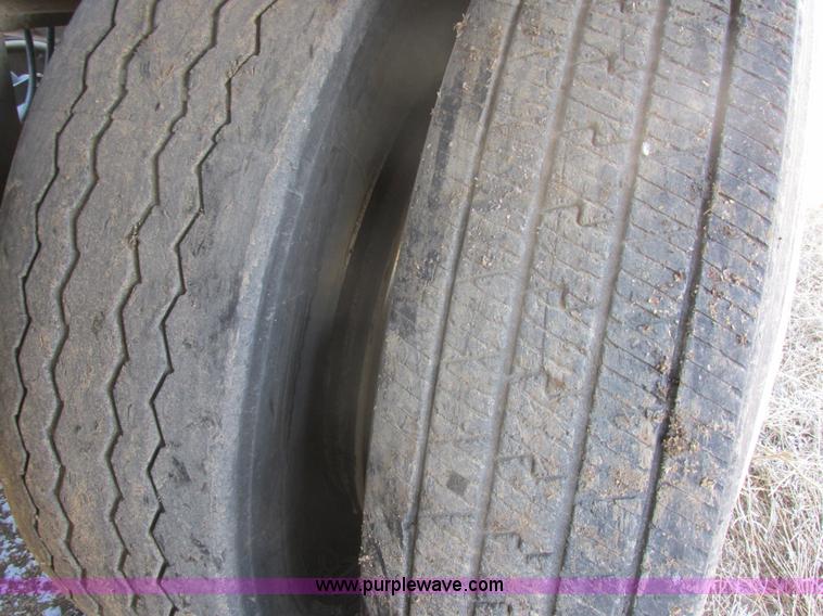 image for item E5414 2003 Smithco 3000VC triple axle side dump trailer