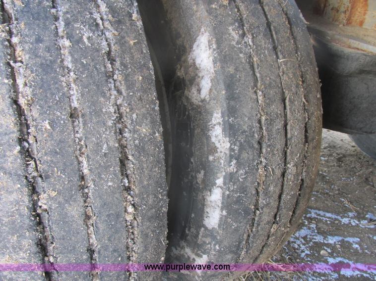 image for item E5414 2003 Smithco 3000VC triple axle side dump trailer