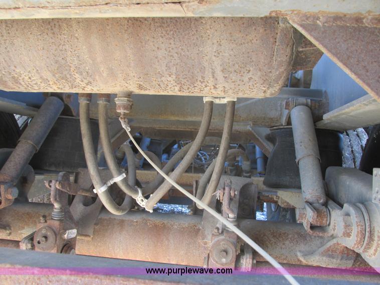 image for item E5414 2003 Smithco 3000VC triple axle side dump trailer