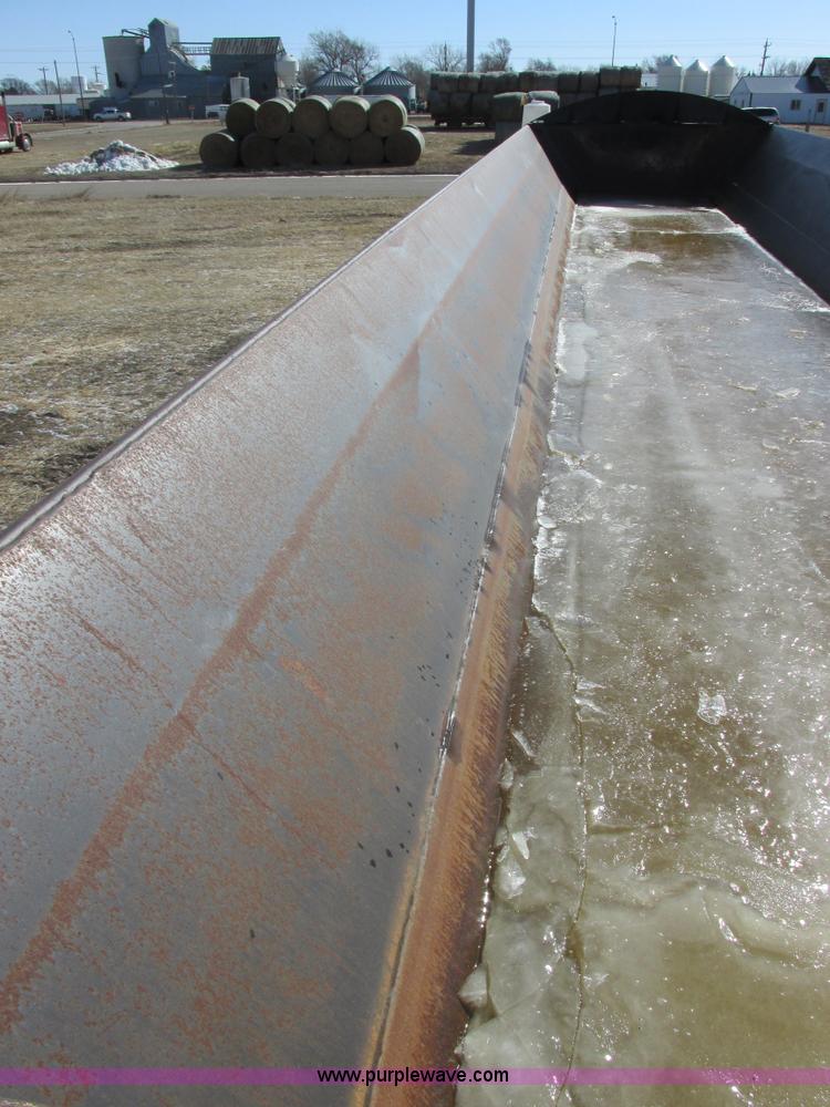 image for item E5414 2003 Smithco 3000VC triple axle side dump trailer