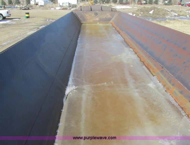 image for item E5414 2003 Smithco 3000VC triple axle side dump trailer