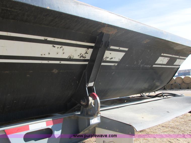 image for item E5414 2003 Smithco 3000VC triple axle side dump trailer