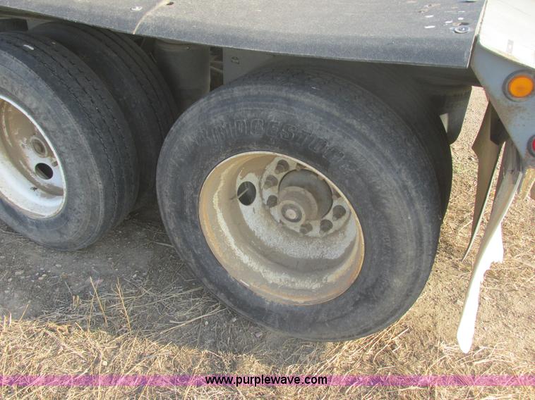 image for item E5414 2003 Smithco 3000VC triple axle side dump trailer