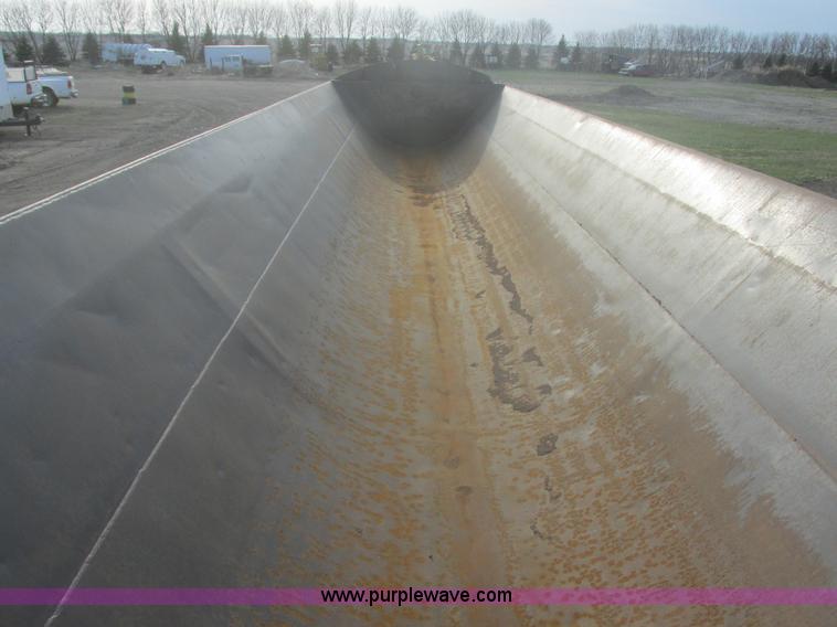 image for item E5414 2003 Smithco 3000VC triple axle side dump trailer