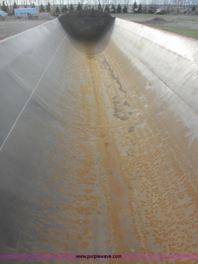 image for item E5414 2003 Smithco 3000VC triple axle side dump trailer