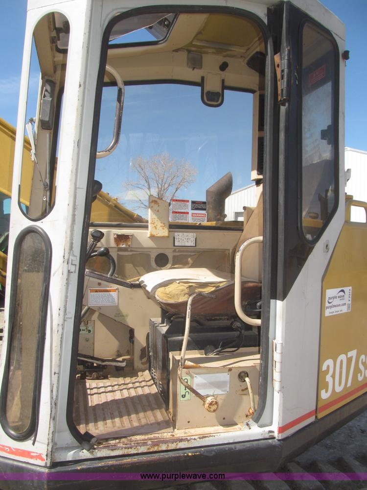 image for item F7318 1994 Caterpillar 307SSR mini excavator