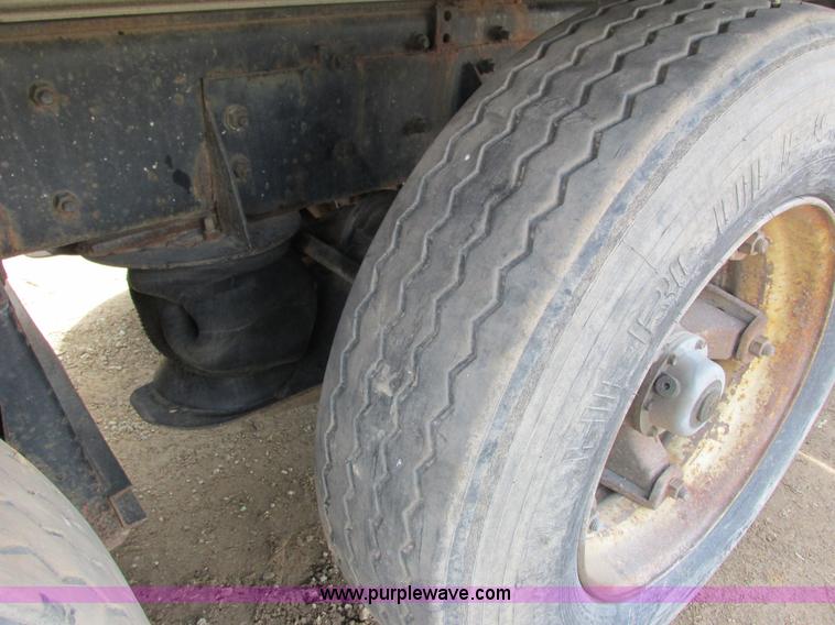 image for item G8806 1993 Mack RB688S quad axle dump truck