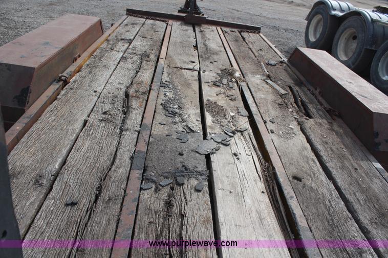 image for item H1416 1979 Tandem axle tilt deck trailer