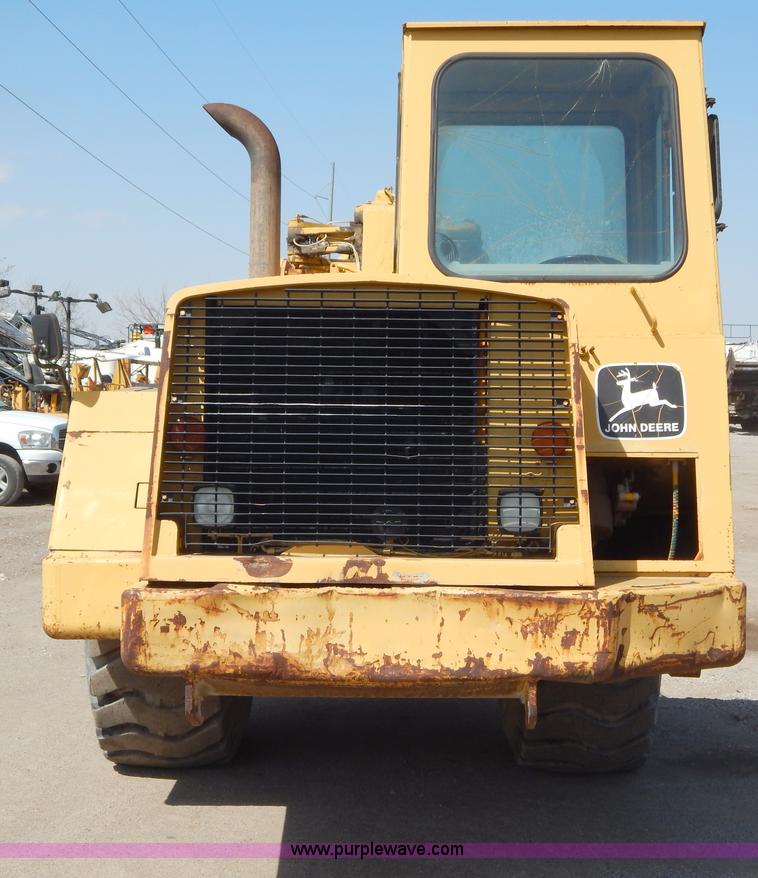 image for item H3478 1993 John Deere 762B paddle scraper