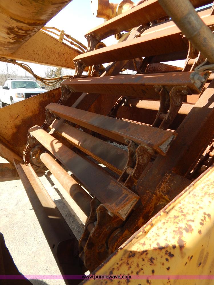 image for item H3478 1993 John Deere 762B paddle scraper