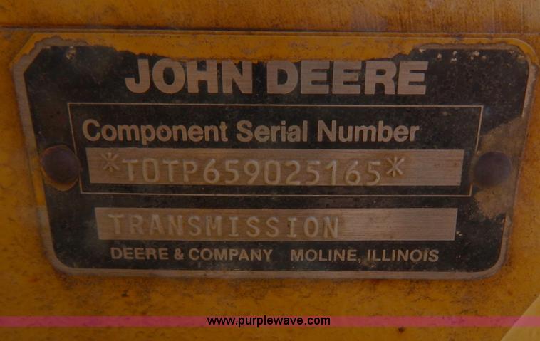 image for item H3478 1993 John Deere 762B paddle scraper