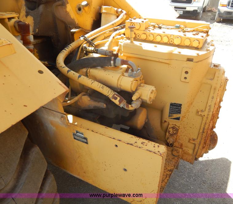 image for item H3478 1993 John Deere 762B paddle scraper