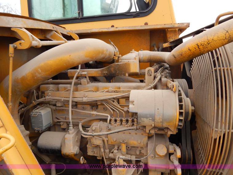 image for item H3478 1993 John Deere 762B paddle scraper