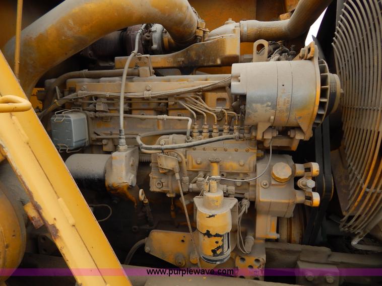 image for item H3478 1993 John Deere 762B paddle scraper