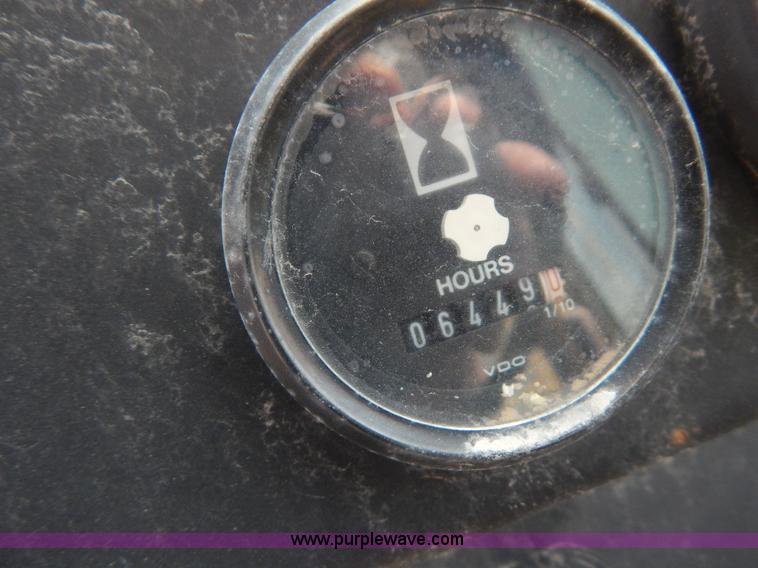 image for item H3478 1993 John Deere 762B paddle scraper