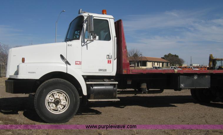 image for item I5551 1997 Volvo WGM25 flatbed truck