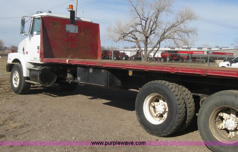 image for item I5551 1997 Volvo WGM25 flatbed truck