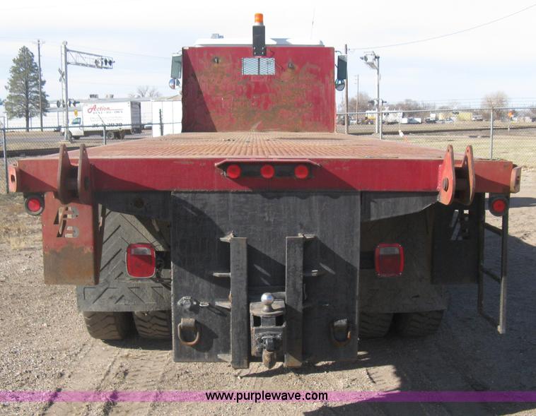 image for item I5551 1997 Volvo WGM25 flatbed truck