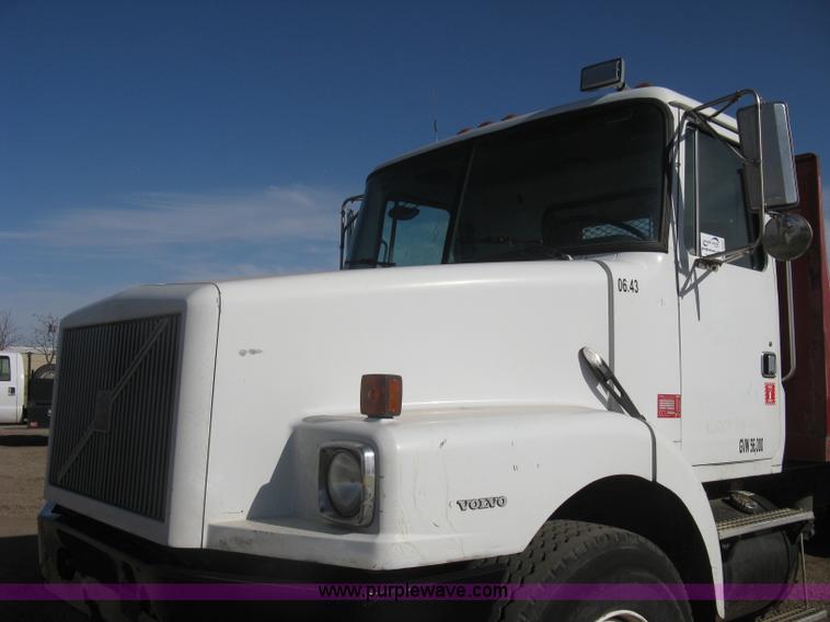 image for item I5551 1997 Volvo WGM25 flatbed truck