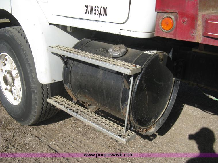 image for item I5551 1997 Volvo WGM25 flatbed truck