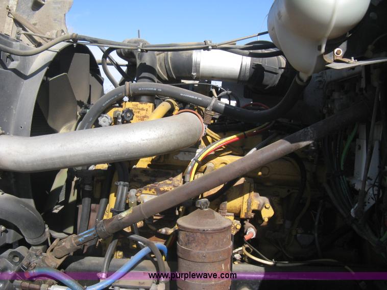 image for item I5551 1997 Volvo WGM25 flatbed truck