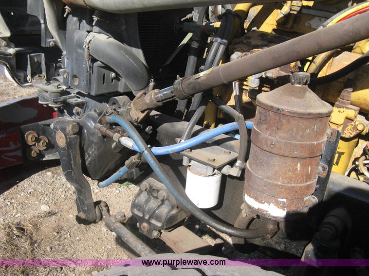 image for item I5551 1997 Volvo WGM25 flatbed truck