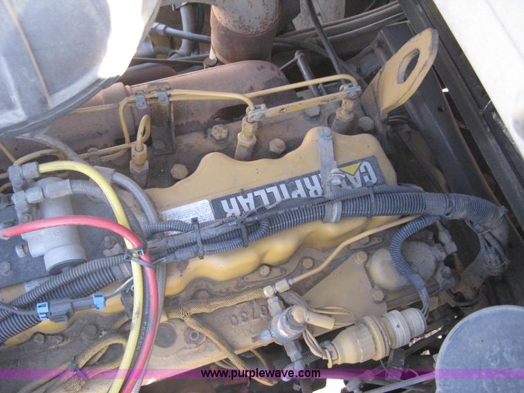 image for item I5551 1997 Volvo WGM25 flatbed truck