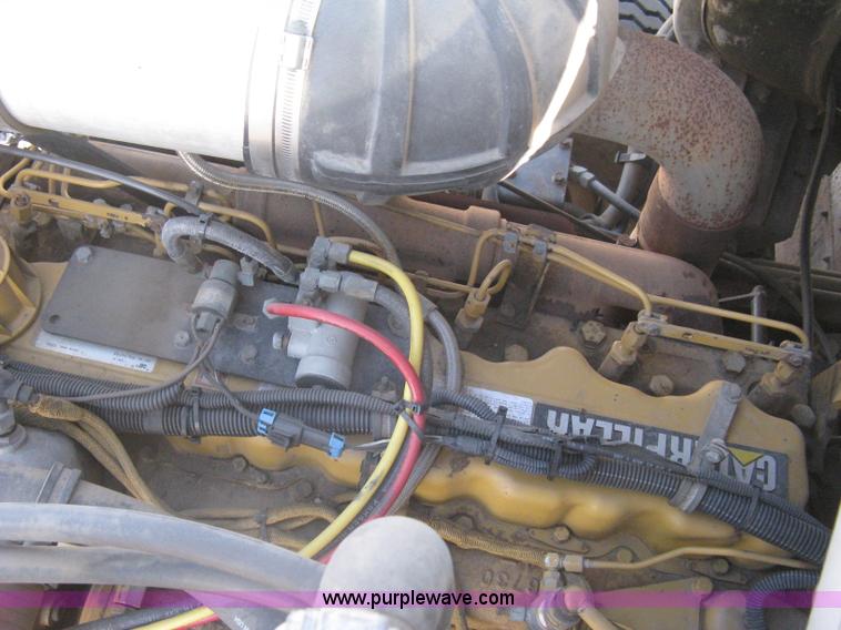 image for item I5551 1997 Volvo WGM25 flatbed truck