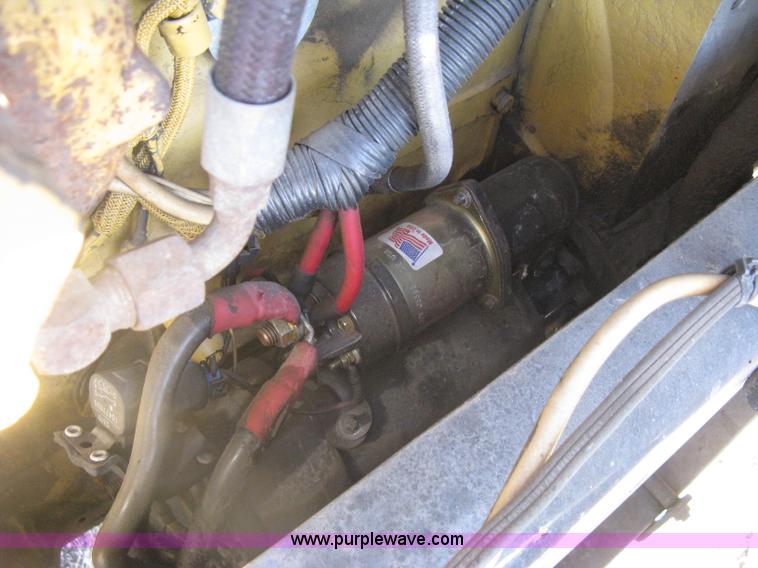 image for item I5551 1997 Volvo WGM25 flatbed truck