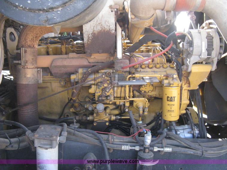 image for item I5551 1997 Volvo WGM25 flatbed truck