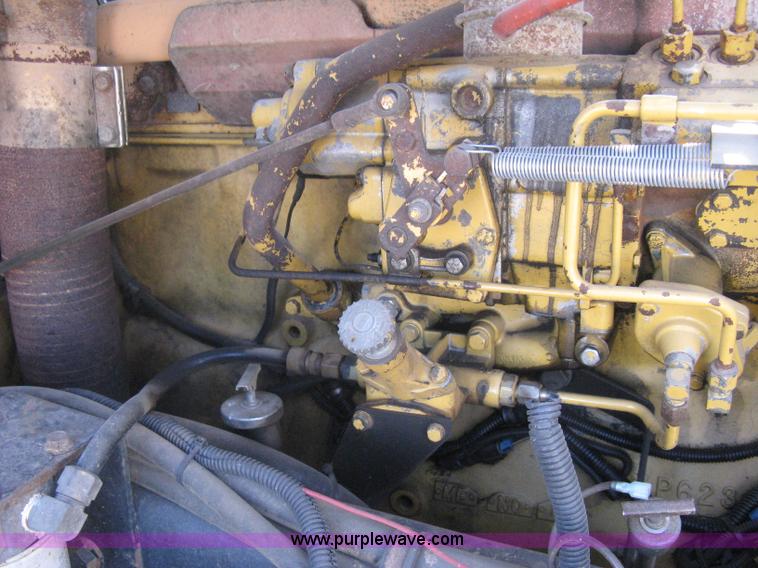 image for item I5551 1997 Volvo WGM25 flatbed truck