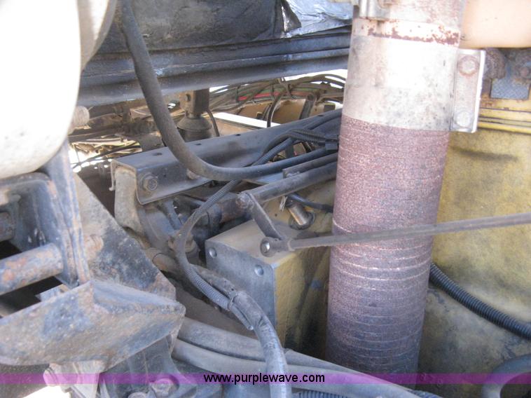 image for item I5551 1997 Volvo WGM25 flatbed truck