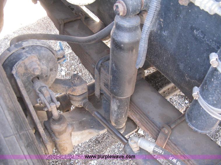 image for item I5551 1997 Volvo WGM25 flatbed truck