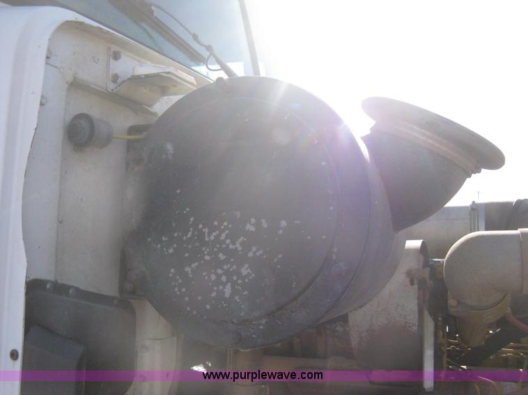 image for item I5551 1997 Volvo WGM25 flatbed truck