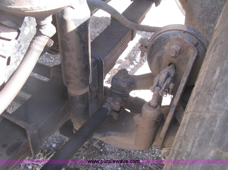 image for item I5551 1997 Volvo WGM25 flatbed truck