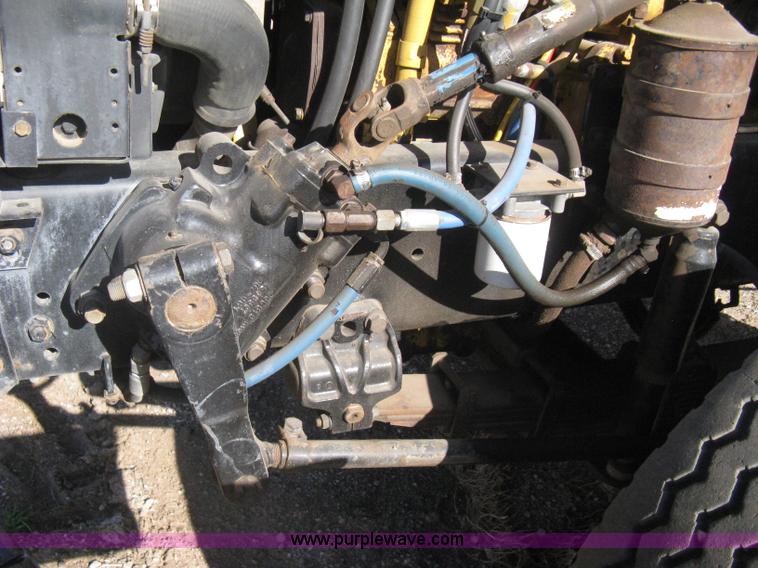 image for item I5551 1997 Volvo WGM25 flatbed truck