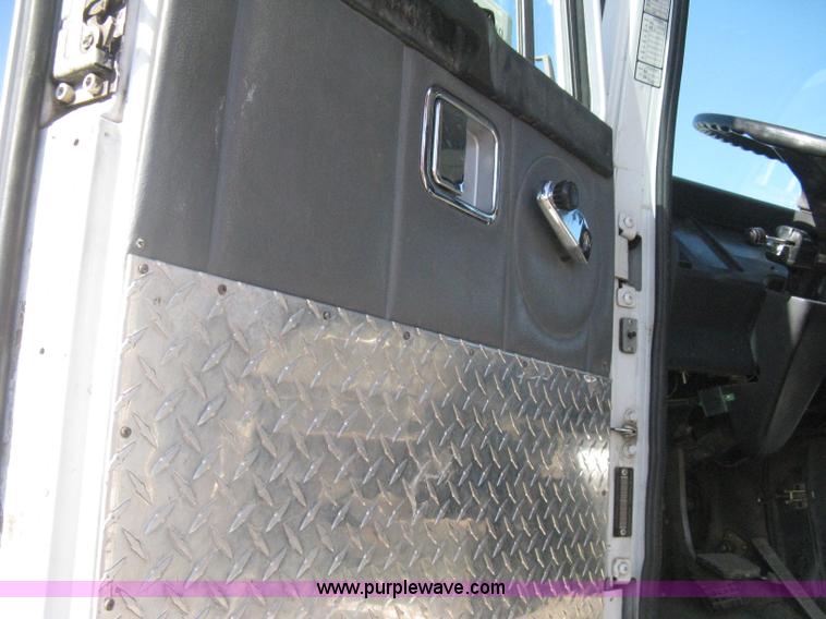 image for item I5551 1997 Volvo WGM25 flatbed truck