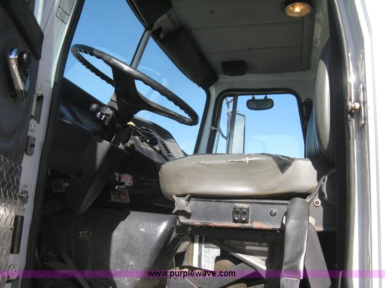 image for item I5551 1997 Volvo WGM25 flatbed truck