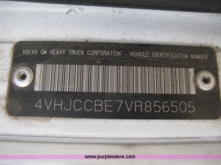 image for item I5551 1997 Volvo WGM25 flatbed truck